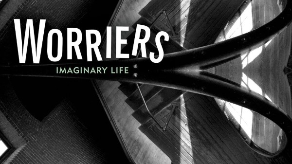 black and white abstract photo with the words Worriers Imaginary Life